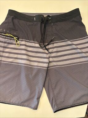 Rip Curl Black and Gray Striped Board Shorts with Neon Yellow Accent